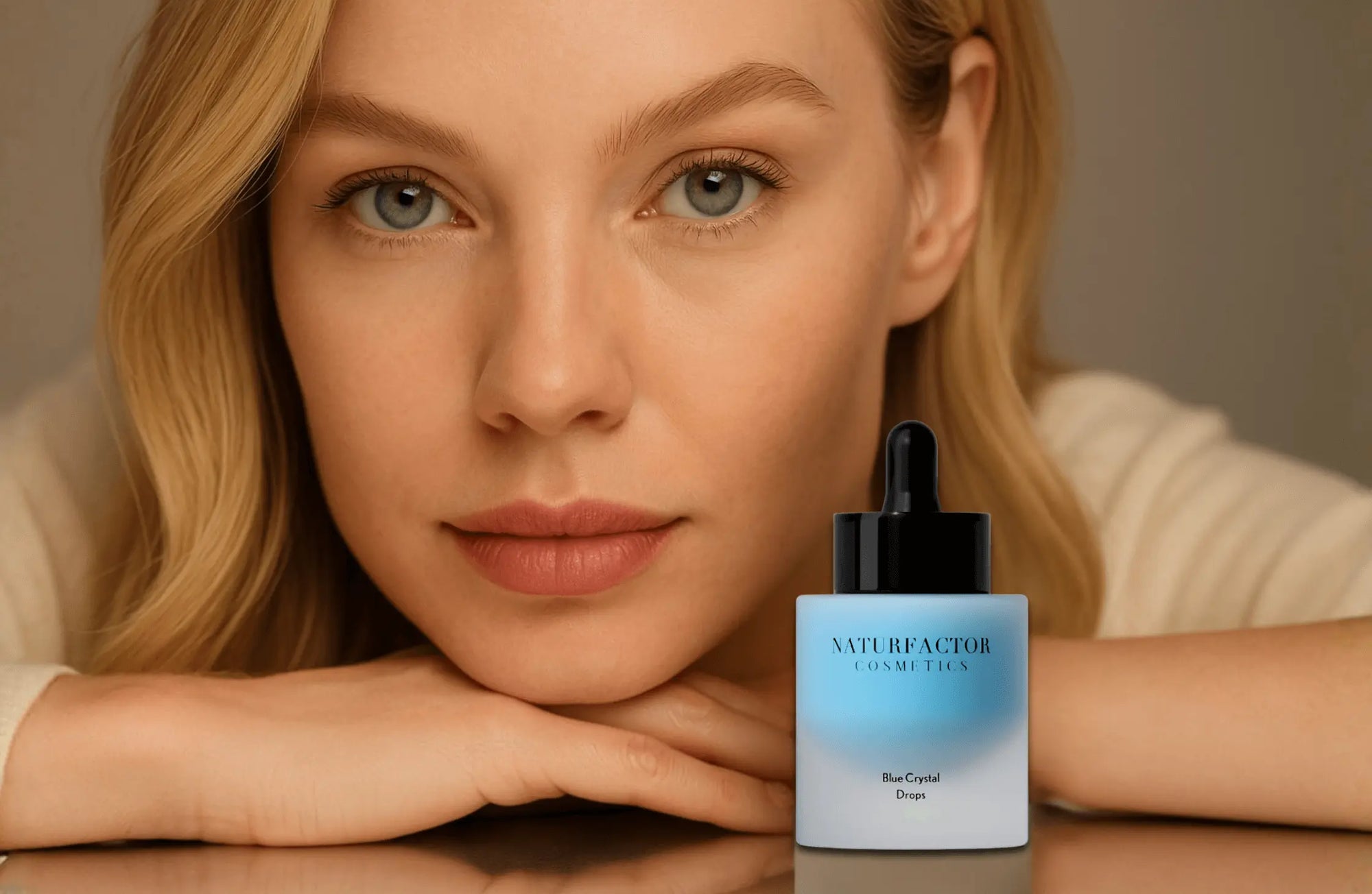 Blonde green-eyed Woman with Blue Crystal Drops